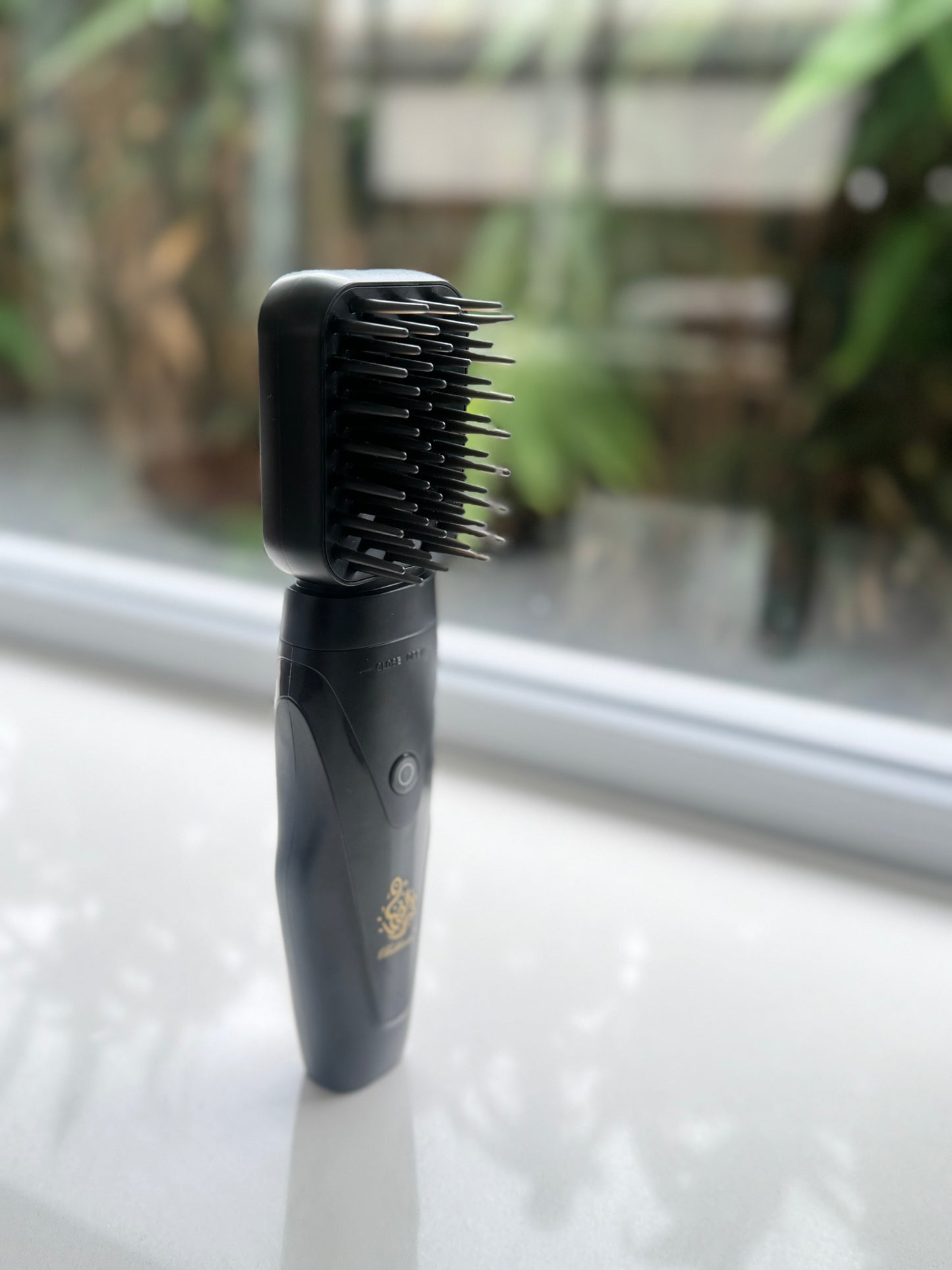 Electric hair brush incense (Bukhoor) burner for hair, clothing, house or office space.