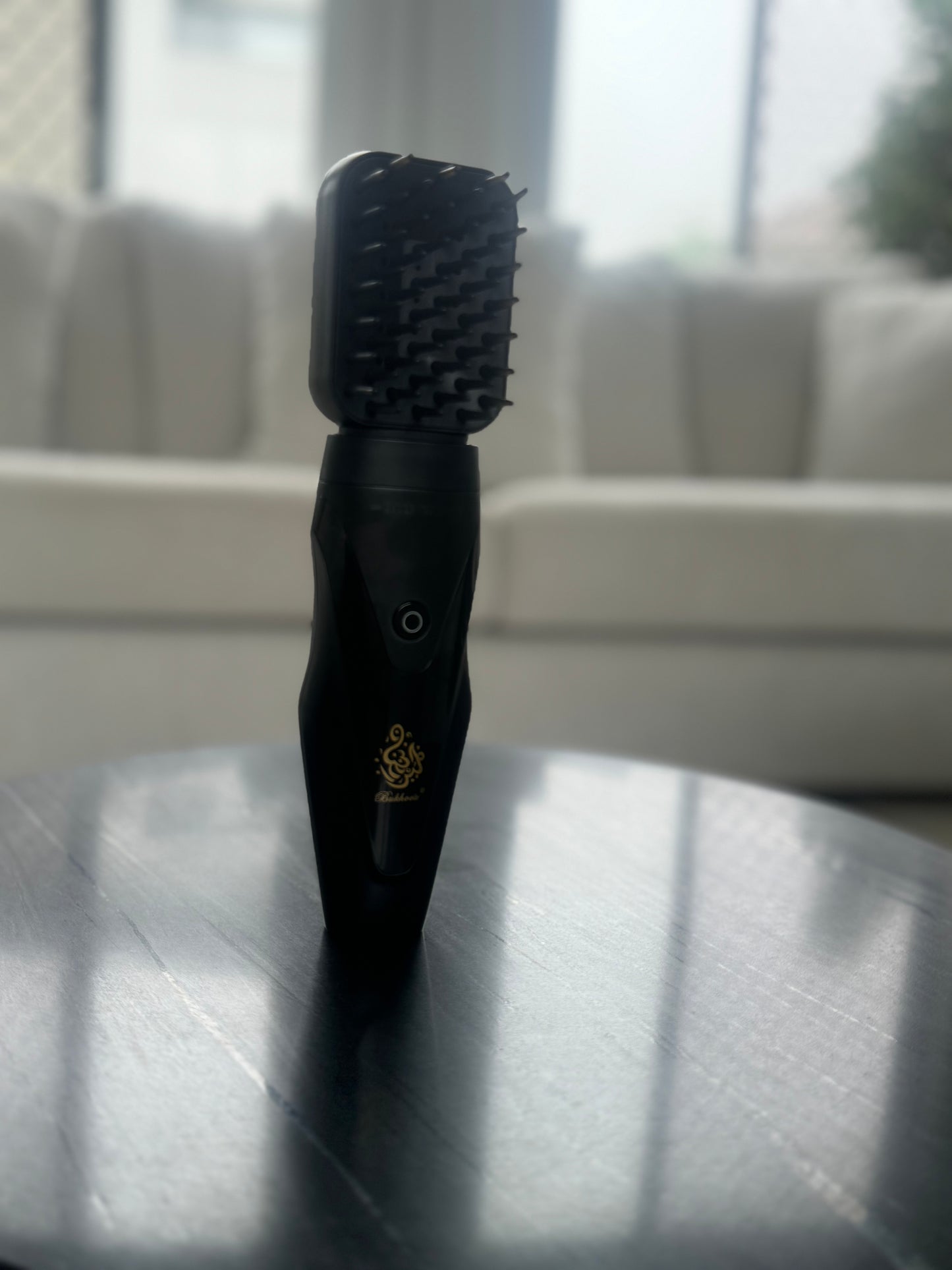 Electric hair brush incense (Bukhoor) burner for hair, clothing, house or office space.