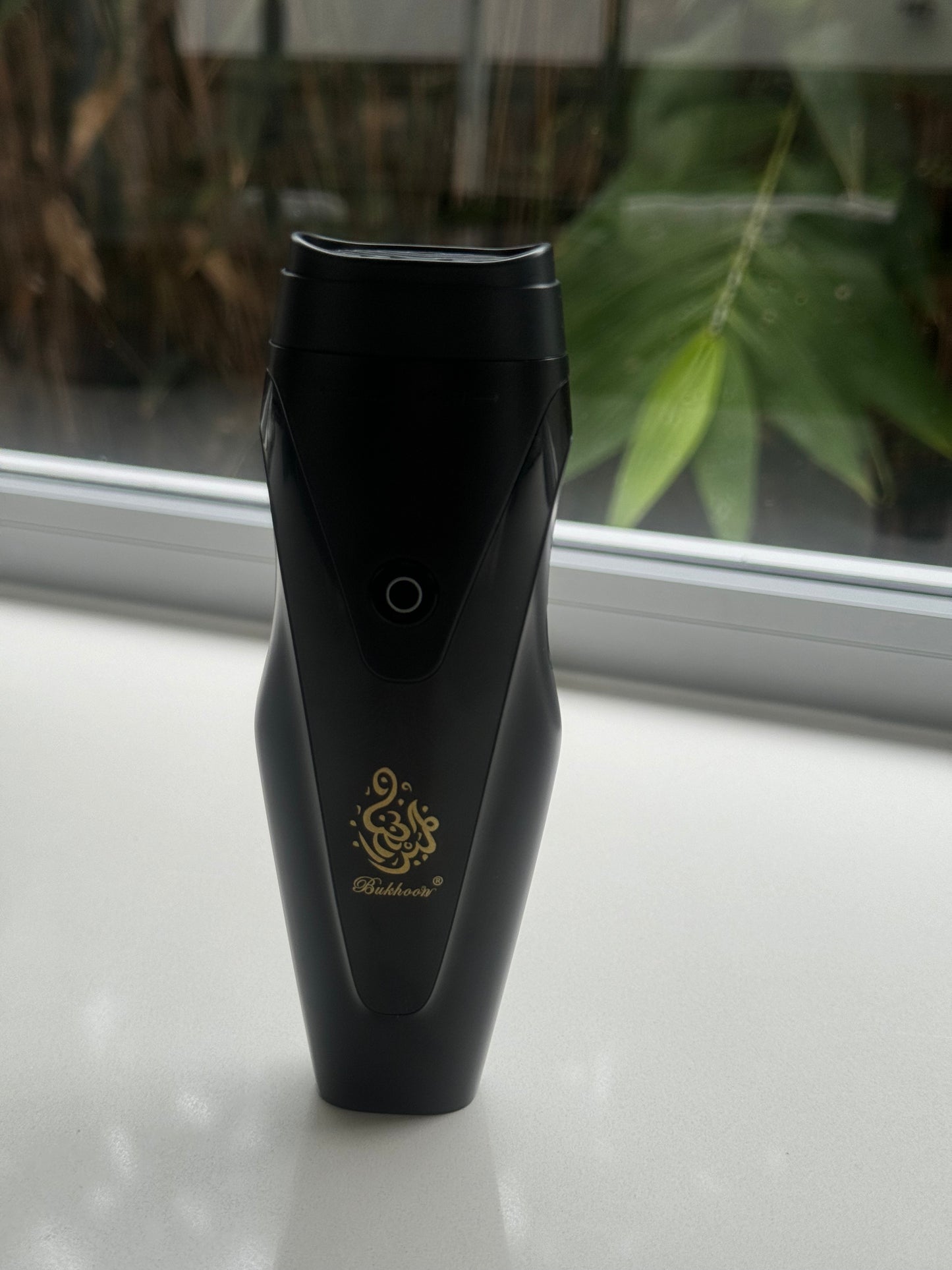 Electric hair brush incense (Bukhoor) burner for hair, clothing, house or office space.